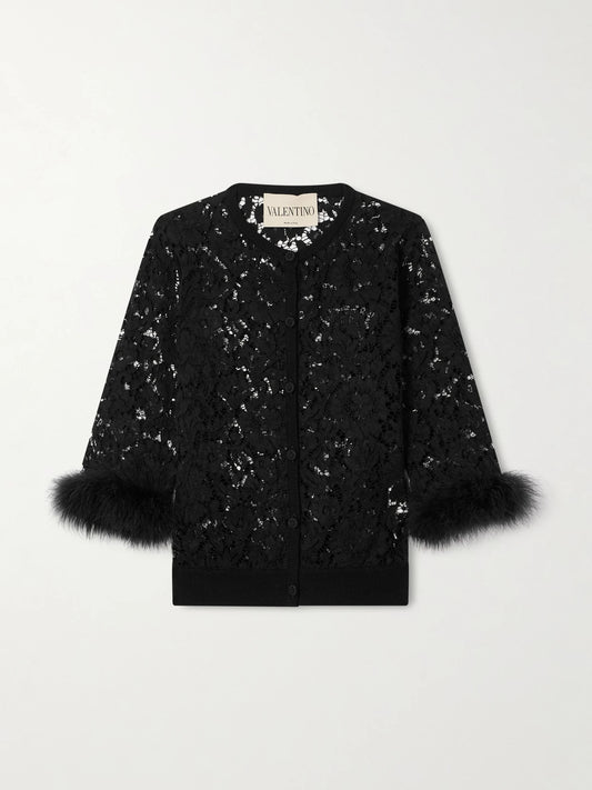 Image of a model wearing Outerwear. Product name - Feather-trimmed Cotton Corded Lace Cardigan in Black colour by brand - Valentino Garavani