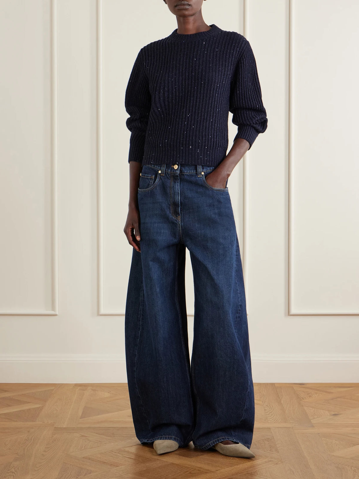 Image of a model wearing Outerwear. Product name - Sequin-trimmed Ribbed-knit Sweater in Navy colour by brand - Brunello Cucinelli