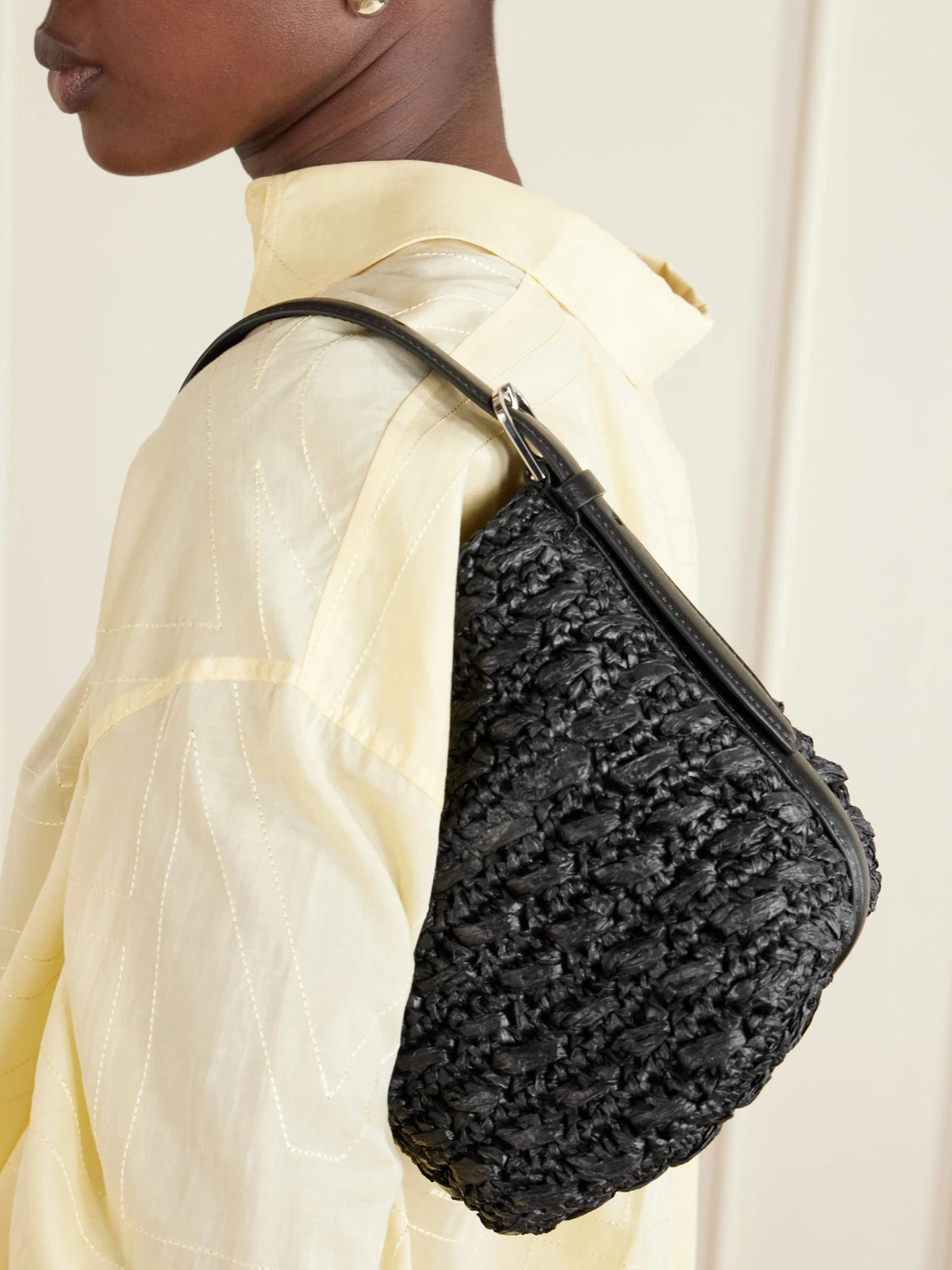 Image of Bags. Product name - Belted Small Leather-trimmed Raffia Shoulder Bag in Black colour by brand - TOTEME
