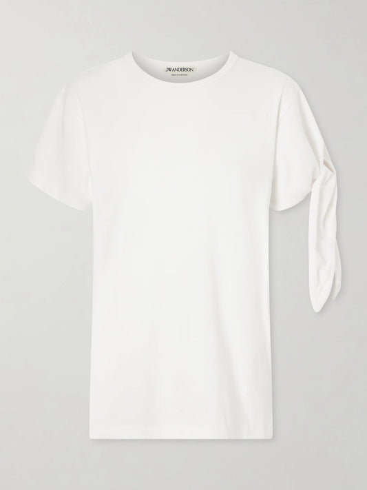 Image of a model wearing Tops. Product name - Tie-detailed Cotton T-shirt in White colour by brand - JW Anderson
