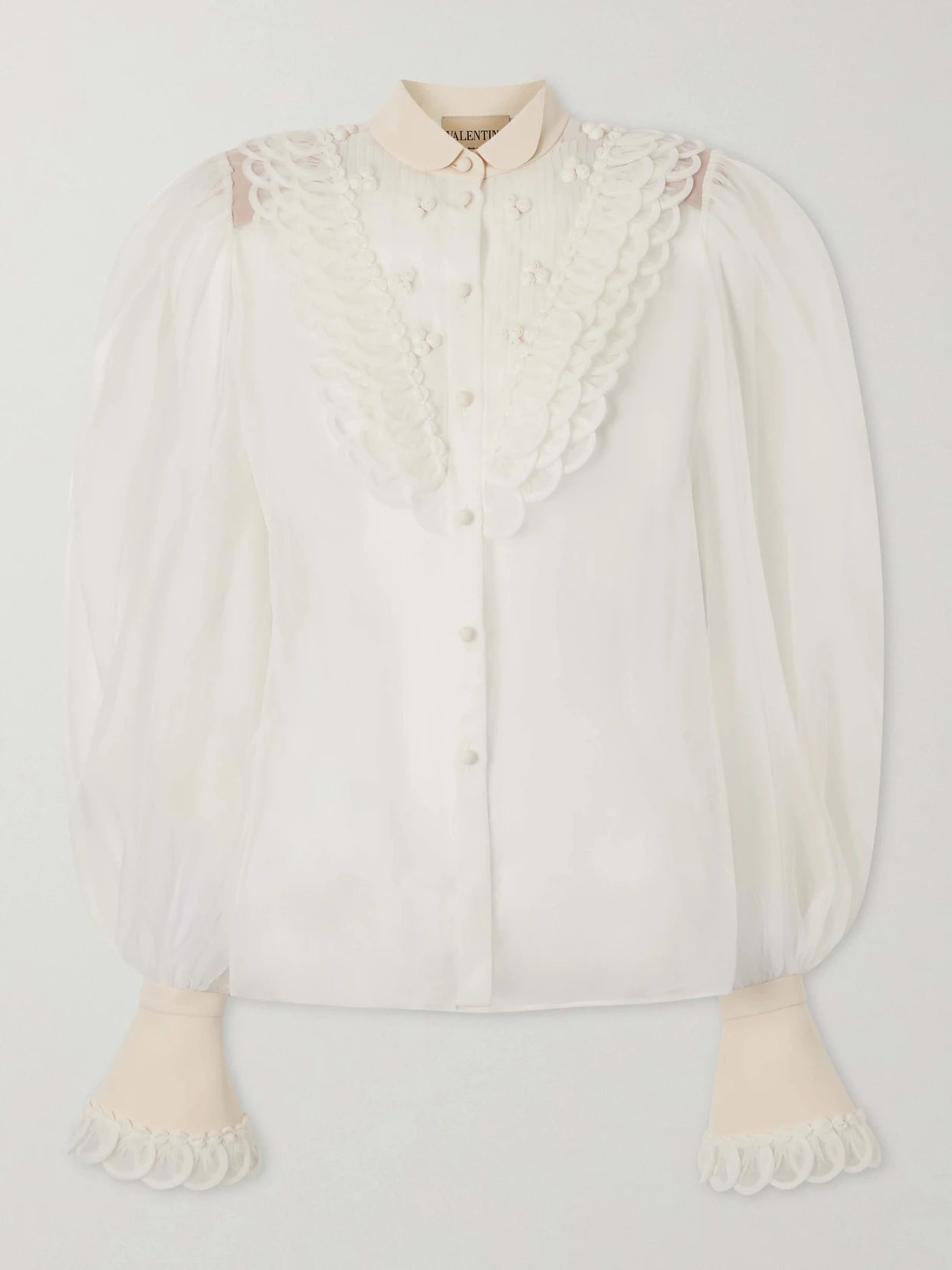 Image of a model wearing Tops. Product name - Silk-organza Blouse in Ivory colour by brand - Valentino Garavani