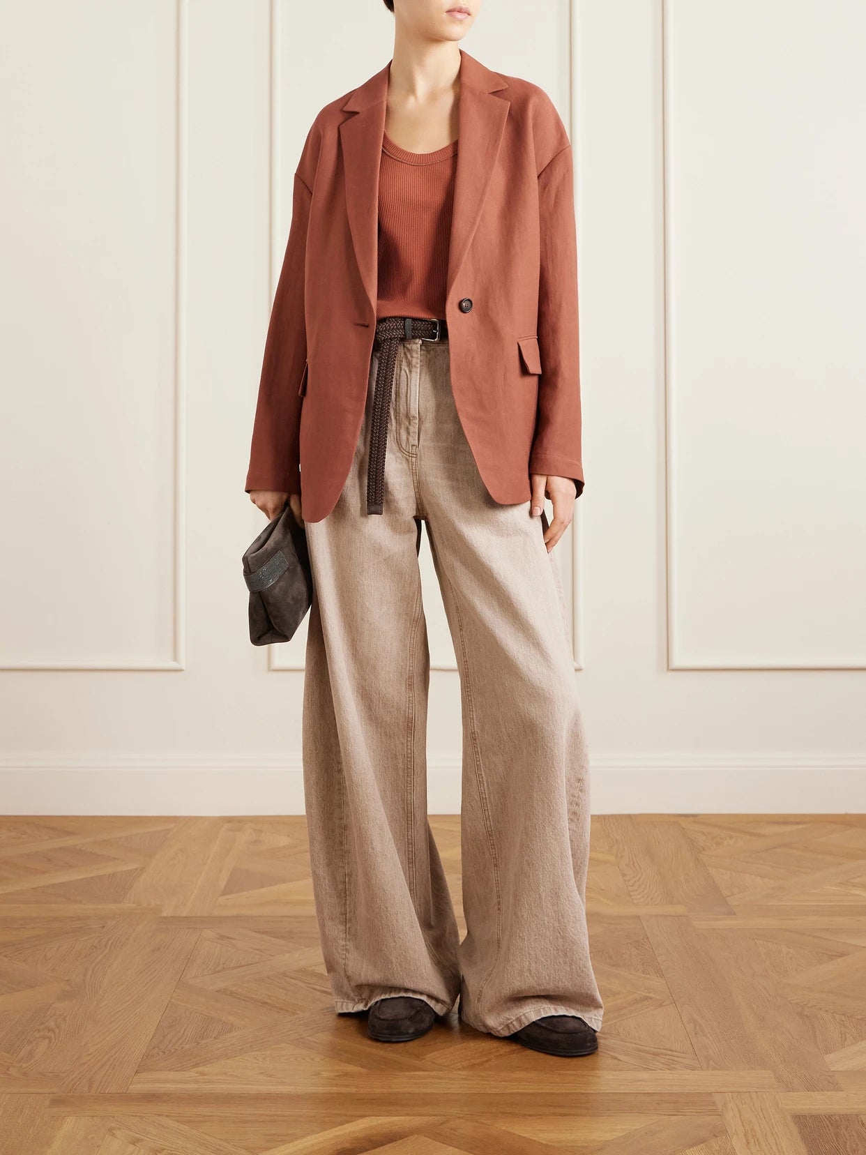 Image of a model wearing Tops. Product name - Ribbed Cotton-blend Tank in Orange colour by brand - Brunello Cucinelli