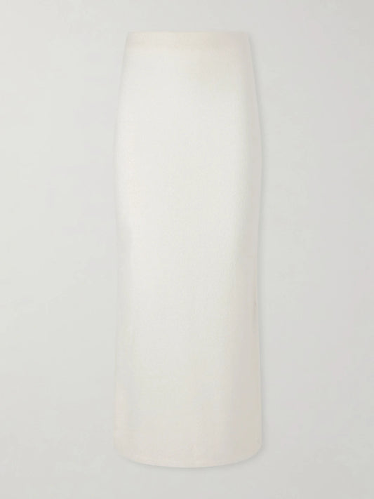 Image of a model wearing Skirts. Product name - Narayan Cashmere Midi Skirt in White colour by brand - Gabriela Hearst