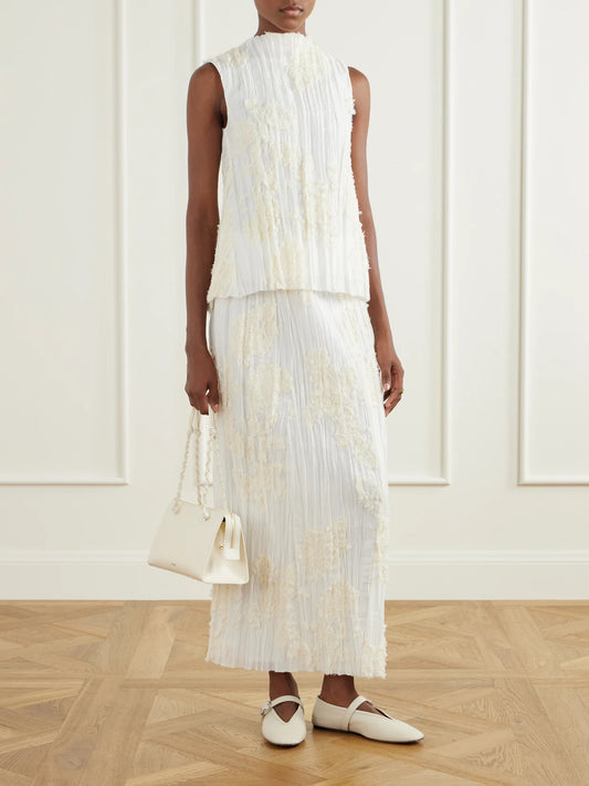 Image of a model wearing Tops. Product name - Daria Plissé Cotton-blend Blouse in Ivory colour by brand - KALLMEYER