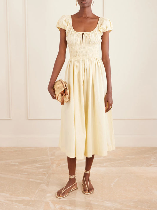Image of Dresses. Product name - Quinn Smocked Organic Cotton-poplin Midi Dress in Pastel yellow colour by brand - DÔEN