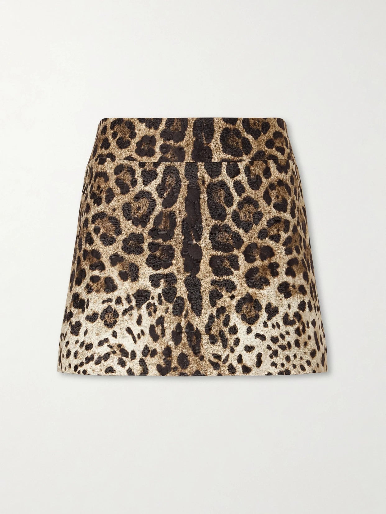 Image of a model wearing Skirts. Product name - Leopard-print Cotton Mini Skirt in Leopard print colour by brand - Dolce & Gabbana