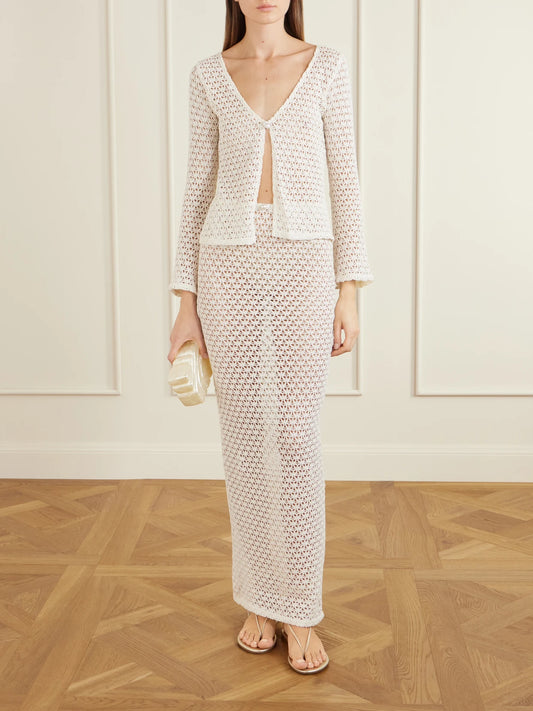 Image of a model wearing Skirts. Product name - Arena Crocheted Cotton Coverup in Ecru colour by brand - Sara Cristina