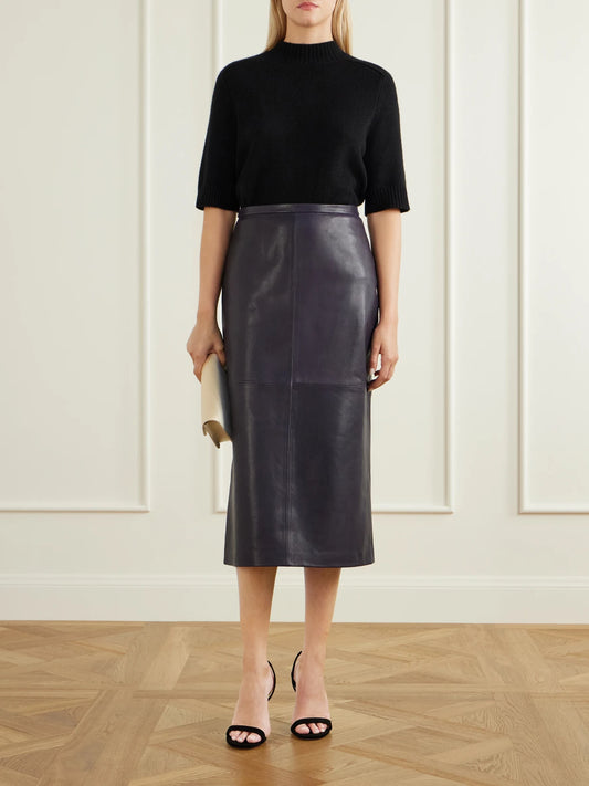 Image of a model wearing Skirts. Product name - Alana Leather Midi Skirt in Navy colour by brand - Nour Hammour