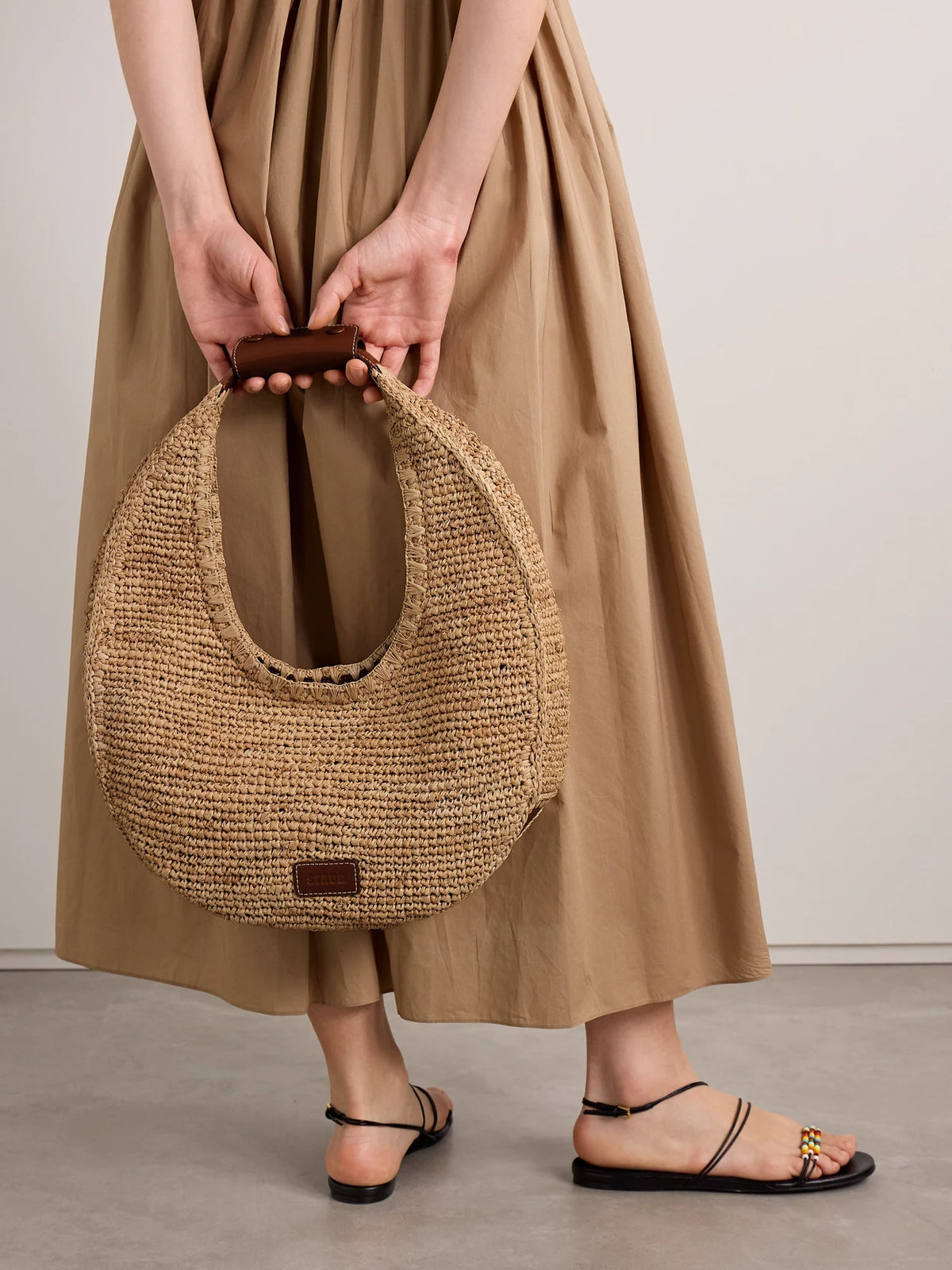 Image of Bags. Product name - Moon Large Leather-trimmed Raffia Tote in Neutral colour by brand - STAUD
