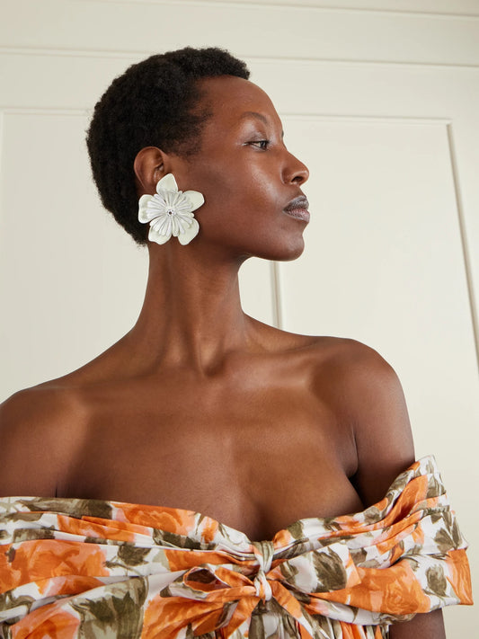 Image of Earrings. Product name - Oversized Resin Clip Earrings in White colour by brand - Chloé
