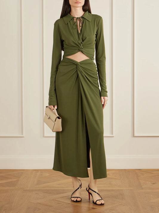 Image of a model wearing Skirts. Product name - Rebecca Satin Midi Skirt in Army green colour by brand - VIOLANTE NESSI