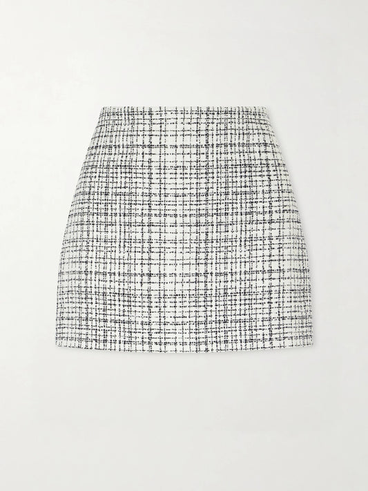 Image of a model wearing Skirts. Product name - Checked Cotton-blend Tweed Mini Skirt in Cream colour by brand - Valentino Garavani
