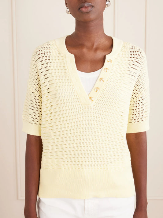 Image of a model wearing Tops. Product name - Callie Open-knit Cotton Top in Yellow colour by brand - Varley