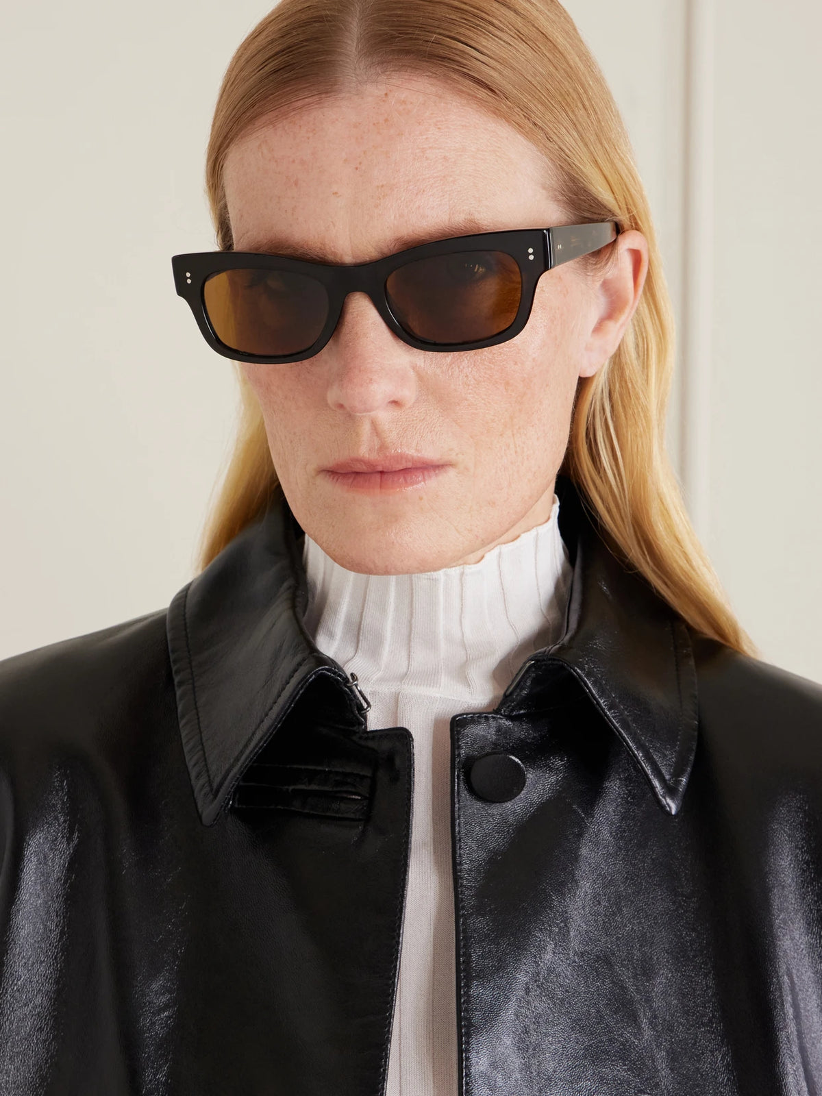 Image of Sunglasses. Product name - Sonia D-frame Acetate Sunglasses in Tortoiseshell colour by brand - Oliver Peoples