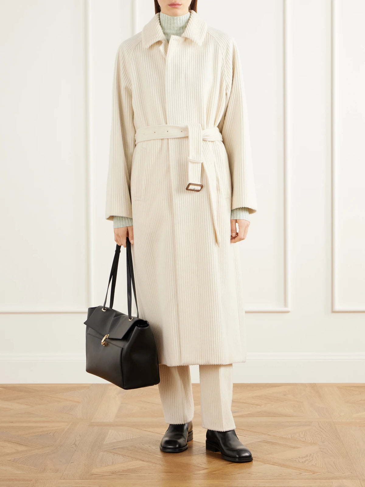 Image of a model wearing Pants. Product name - Wool And Cashmere-blend Corduroy Straight-leg Pants in Ivory, Brown colour by brand - Auralee