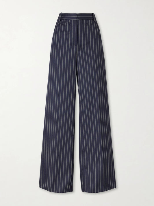Image of a model wearing Pants. Product name - Rivers Striped Wool Wide-leg Pants in Navy colour by brand - Nili Lotan