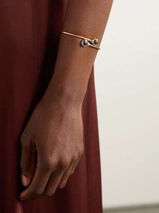 Image of Bracelets. Product name - Mini Nudo 18-karat Rose And White Gold, Topaz And Diamond Bangle in Multi colour by brand - Pomellato
