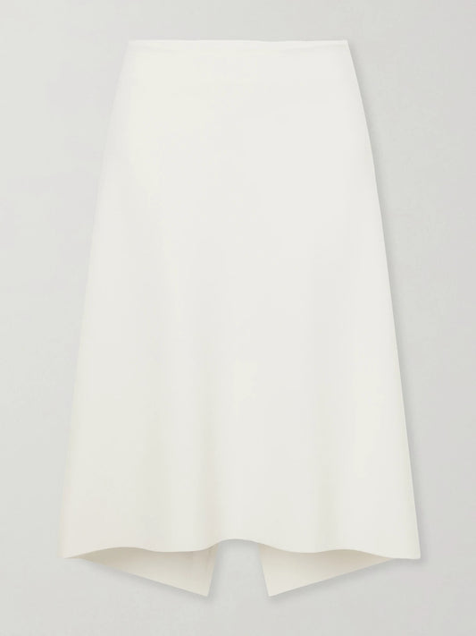 Image of a model wearing Skirts. Product name - Jersey Midi Skirt in White colour by brand - TOTEME