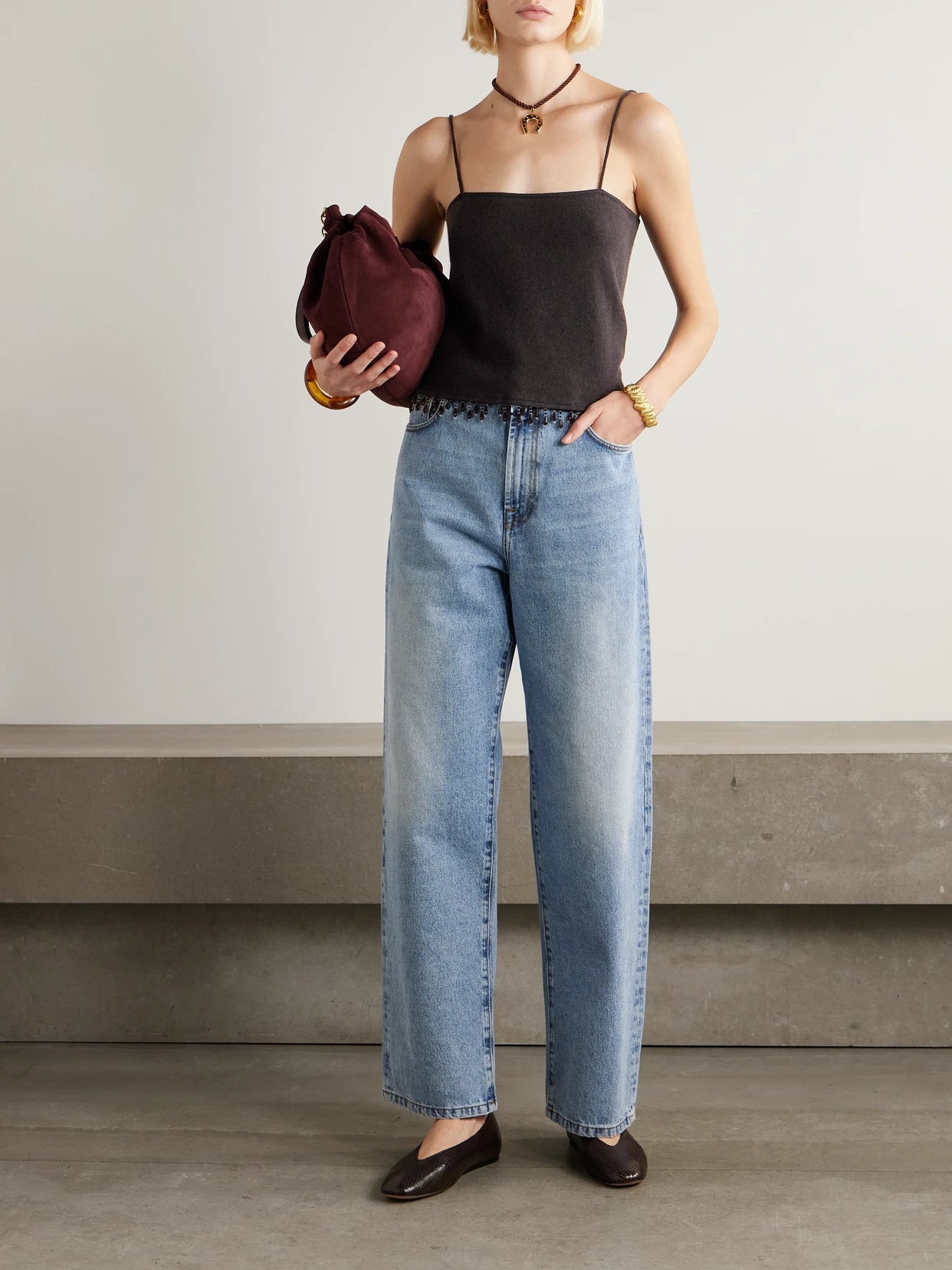 Image of a model wearing Tops. Product name - Fringed Bead-embellished Wool And Cashmere-blend Top in Dark brown colour by brand - BODE