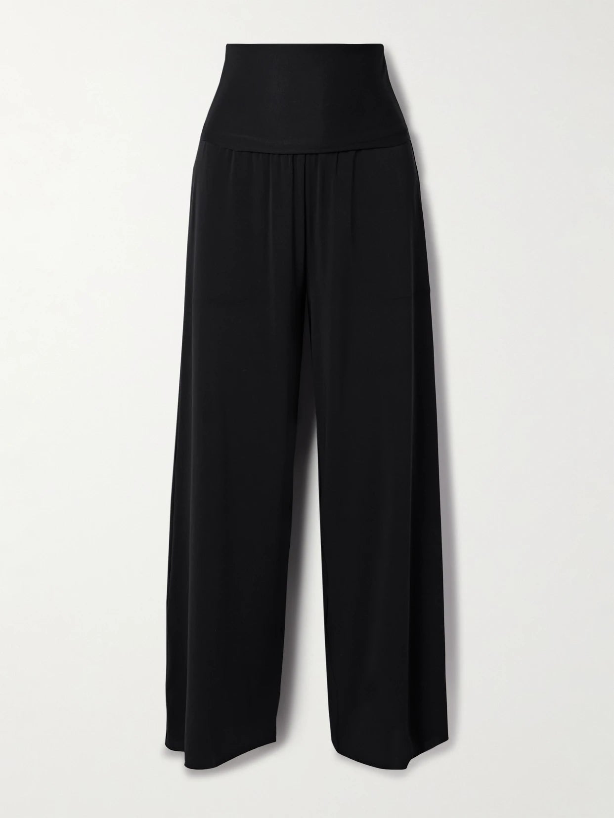Image of a model wearing Pants. Product name - Les Essentiels Dao Convertible Stretch-jersey Jumpsuit in Black colour by brand - Eres