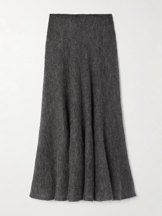 Image of a model wearing Skirts. Product name - Pleated Mohair-blend Midi Skirt in Light gray colour by brand - Alaïa