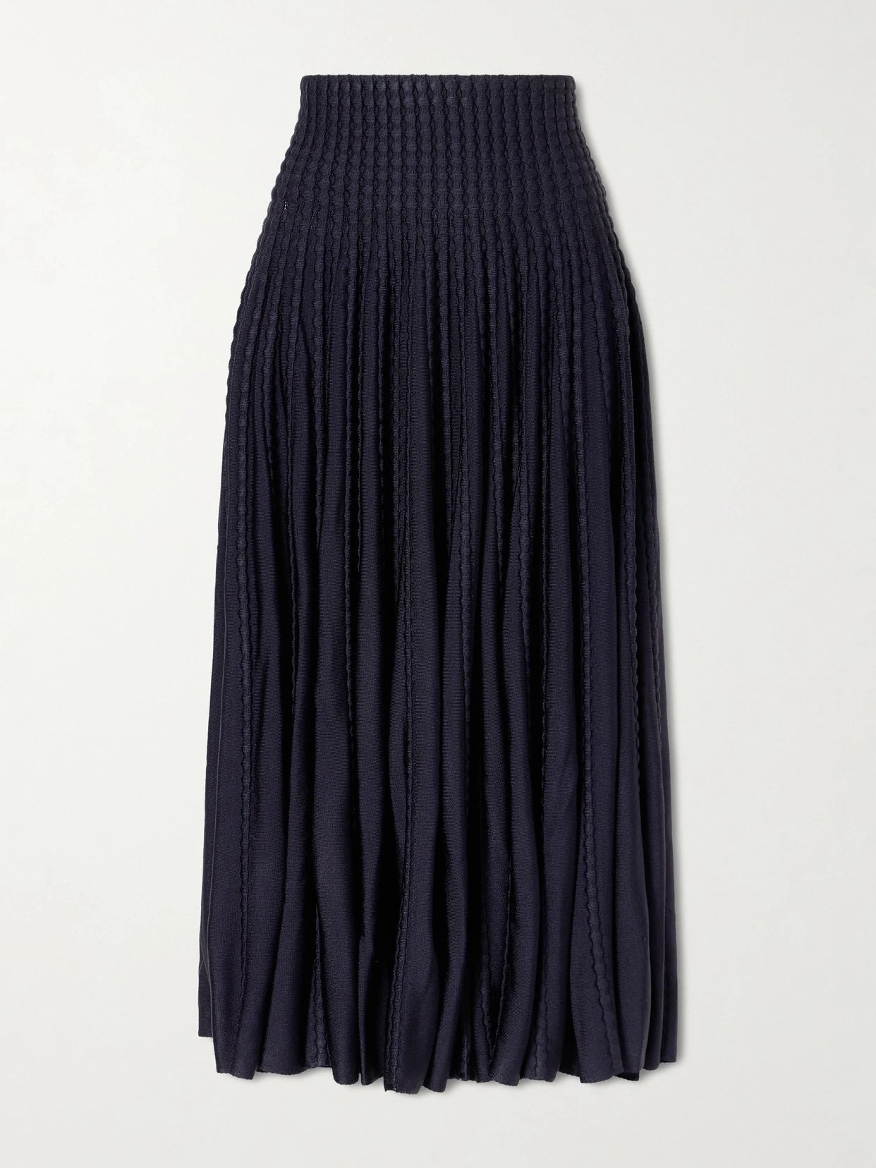 Image of a model wearing Skirts. Product name - Textured Knitted Midi Skirt in Navy colour by brand - Alaïa