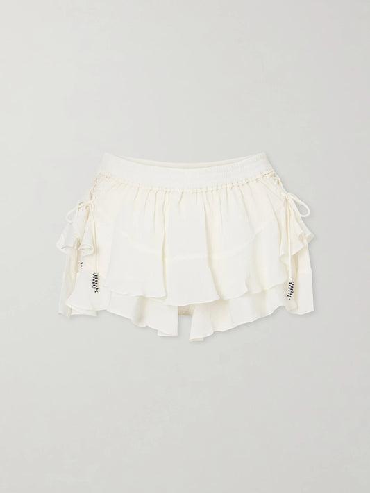 Image of a model wearing Skirts. Product name - Geisa Silk-chiffon Mini Skirt in Ecru colour by brand - ISABEL MARANT