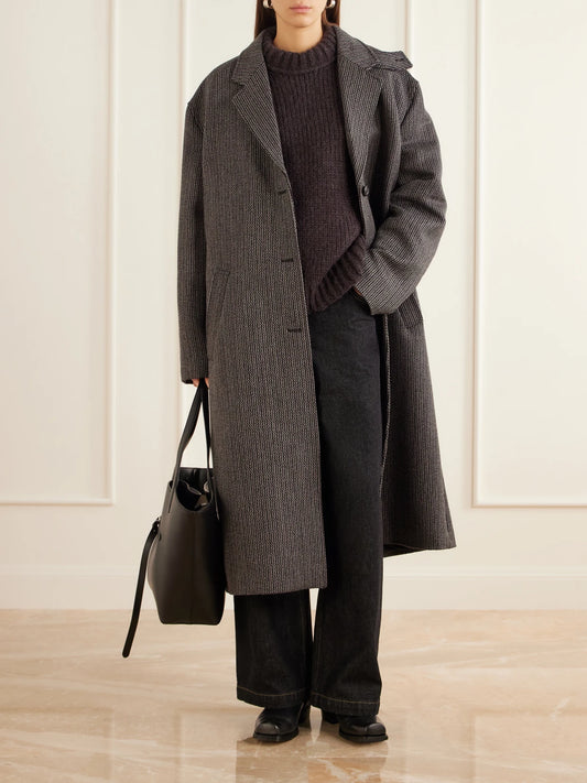 Image of a model wearing Outerwear. Product name - Ribbed Merino Wool And Alpaca-blend Sweater in Dark brown colour by brand - Our Legacy