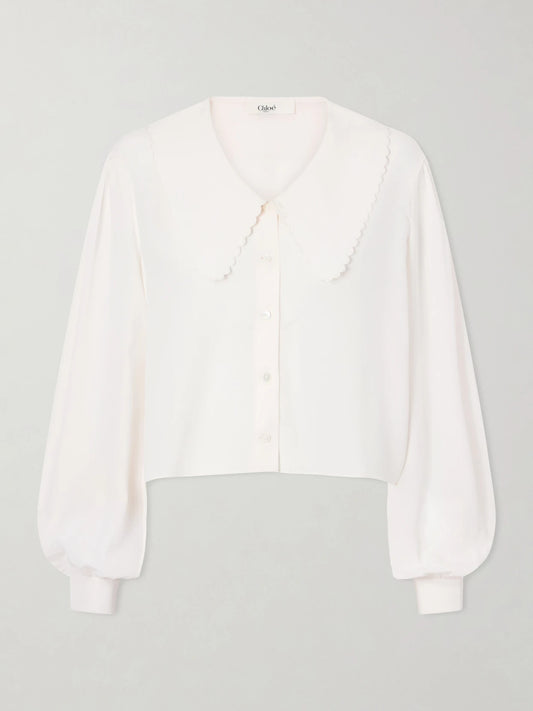 Image of a model wearing Tops. Product name - Cropped Silk-crepe De Chine Blouse in White colour by brand - Chloé