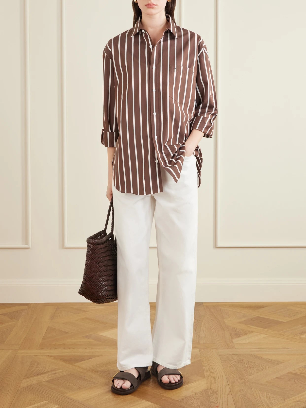 Image of a model wearing Tops. Product name - Striped Organic Cotton-poplin Shirt in Brown colour by brand - Matteau