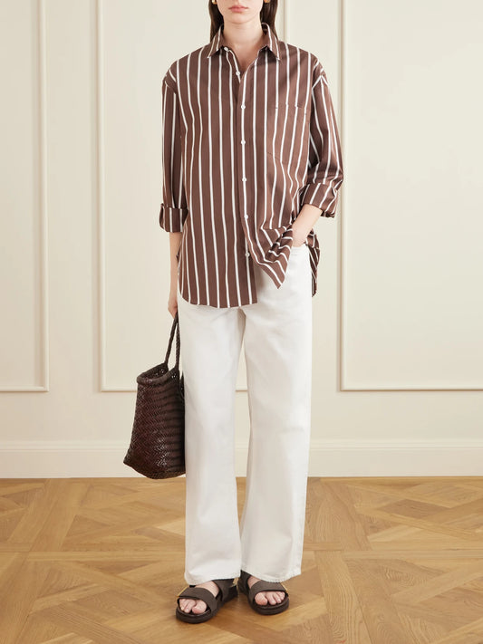 Image of a model wearing Tops. Product name - Striped Organic Cotton-poplin Shirt in Brown colour by brand - Matteau