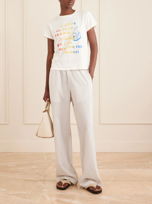 Image of a model wearing Tops. Product name - The Boxy Goodie Goodie Printed Cotton-jersey T-shirt in White colour by brand - Mother