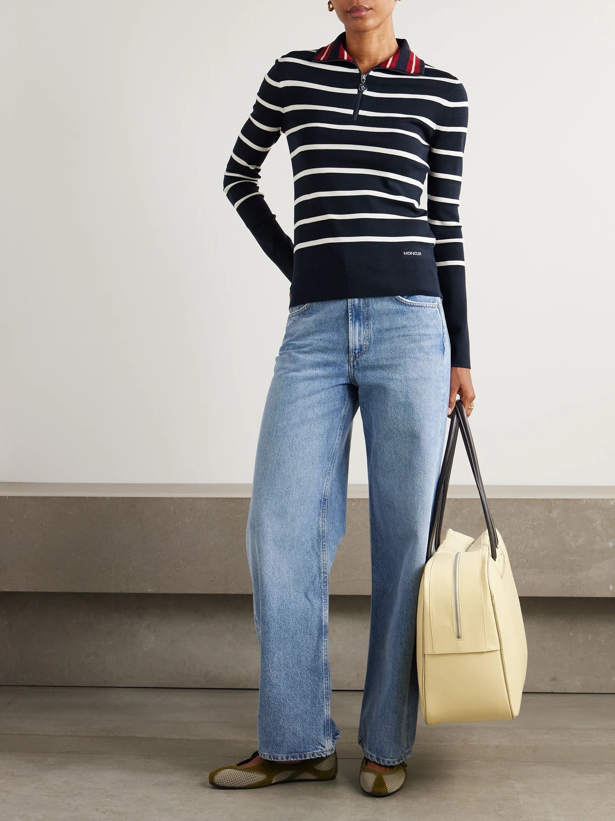 Image of a model wearing Outerwear. Product name - Striped Wool Sweater in Navy colour by brand - Moncler