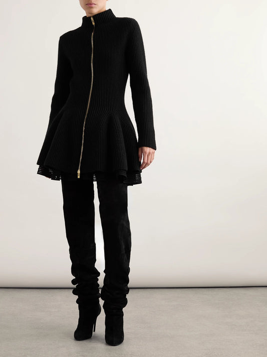 Image of a model wearing Outerwear. Product name - Ribbed Wool And Cashmere-blend Peplum Cardigan in Black colour by brand - Alaïa