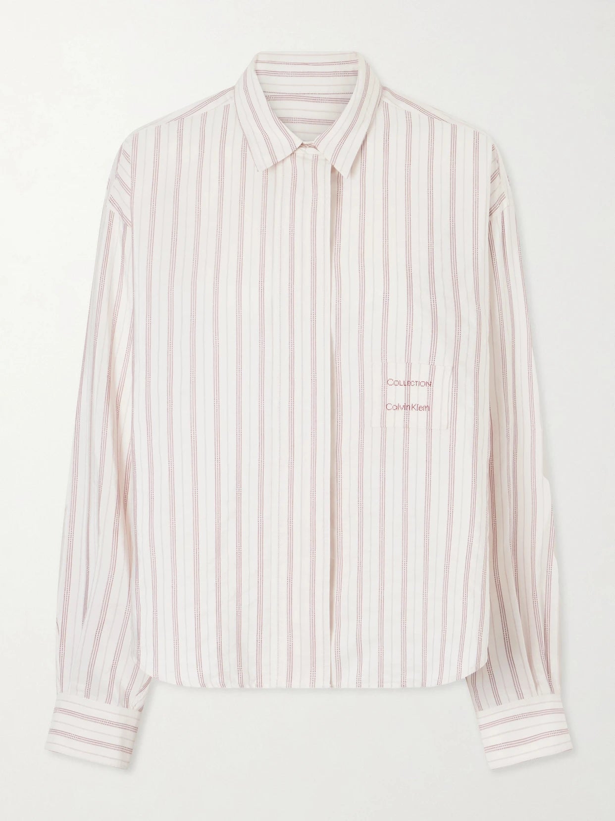 Image of a model wearing Tops. Product name - Amari Pinstriped Cotton And Silk-blend Shirt in Cream colour by brand - Calvin Klein Collection