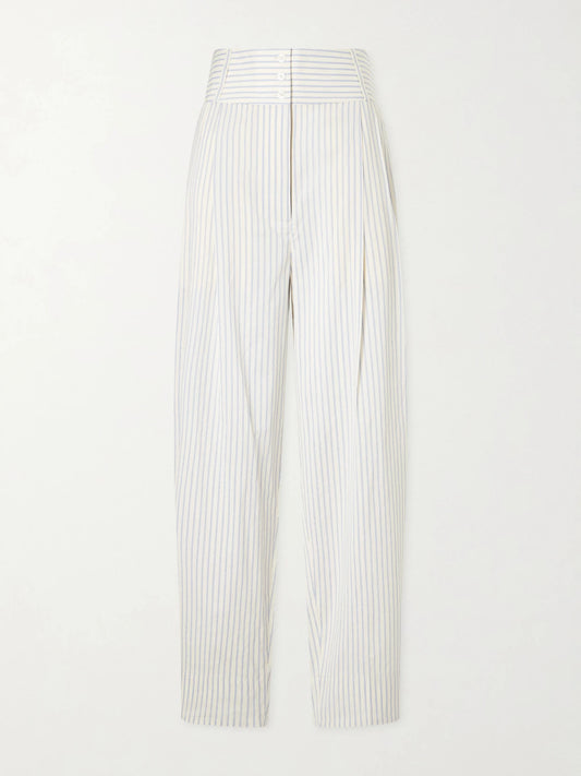 Image of a model wearing Pants. Product name - Pleated Striped Cotton And Silk-blend Straight-leg Pants in White colour by brand - TOTEME