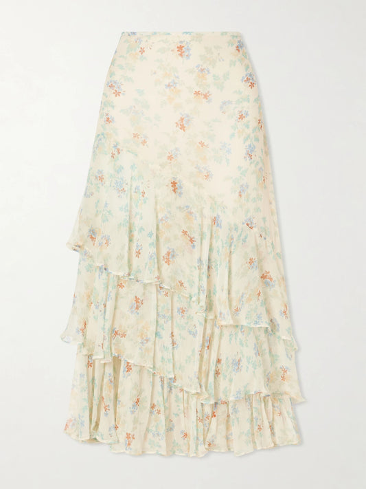 Image of a model wearing Skirts. Product name - Meadow Floral-print Crepon-silk Midi Skirt in Cream colour by brand - Ulla Johnson