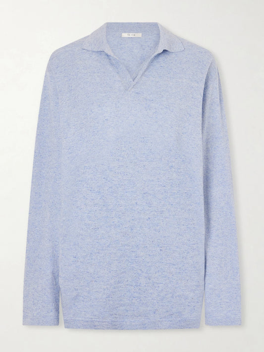 Image of a model wearing Tops. Product name - Niosa Cotton And Linen-blend Polo Shirt in Light blue colour by brand - The Row