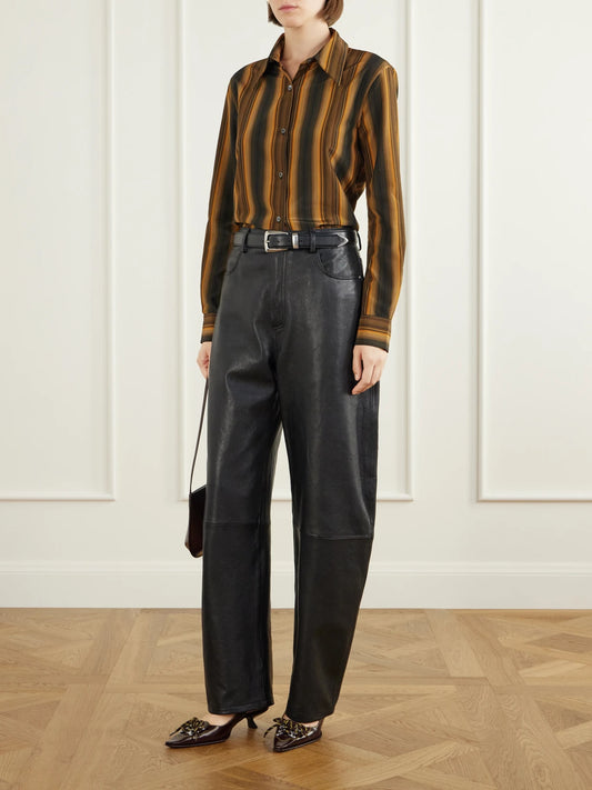 Image of a model wearing Tops. Product name - Striped Cotton And Silk-blend Shirt in Orange colour by brand - Marni
