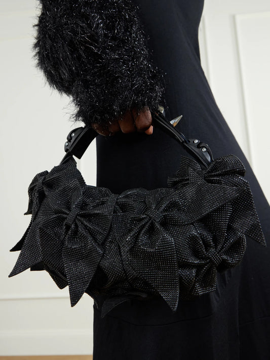 Image of Bags. Product name - + Innerraum Bow-detailed Embellished Polyurethane And Canvas Shoulder Bag in Black colour by brand - Junya Watanabe