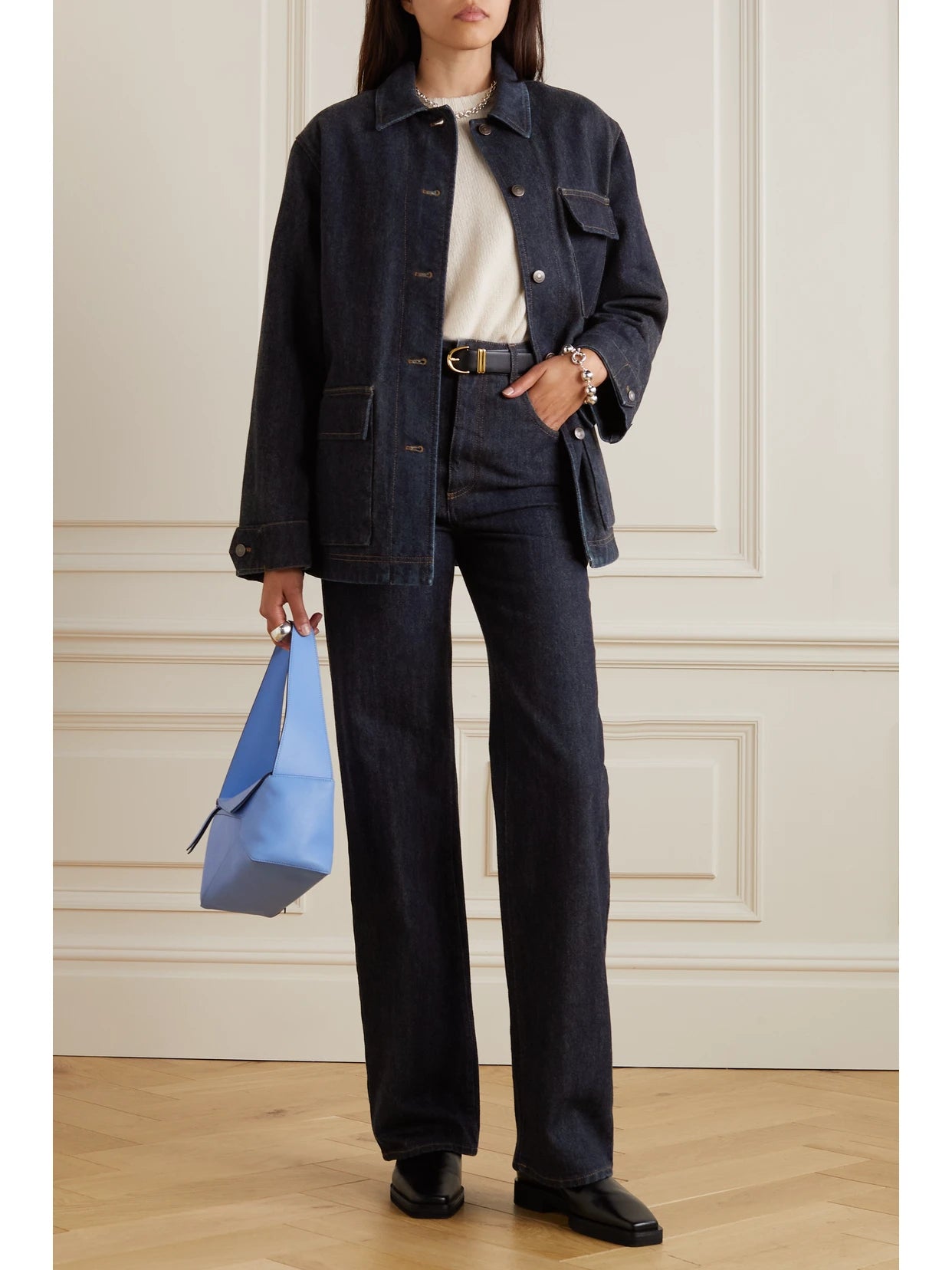 Image of a model wearing Tops. Product name - Denim Shirt in Indigo colour by brand - Loro Piana