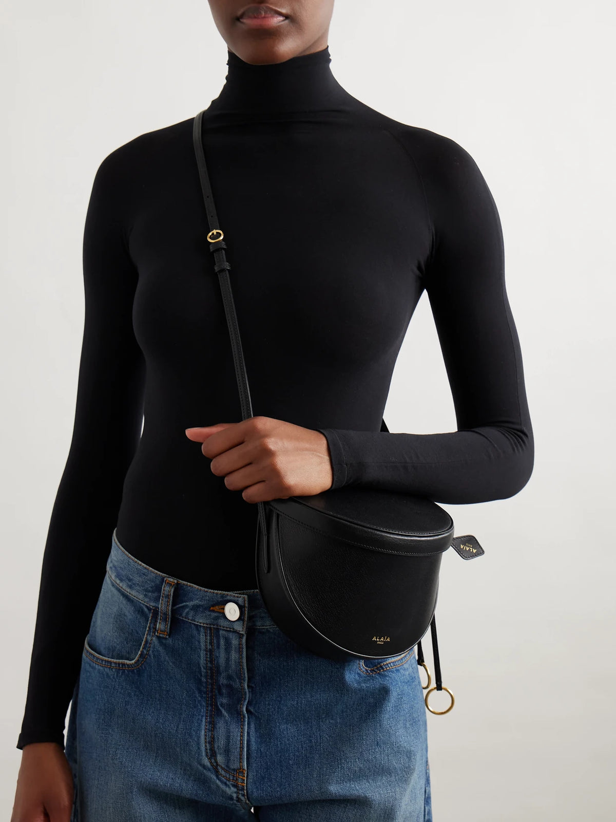 Image of Bags. Product name - Textured-leather Shoulder Bag in Black colour by brand - Alaïa
