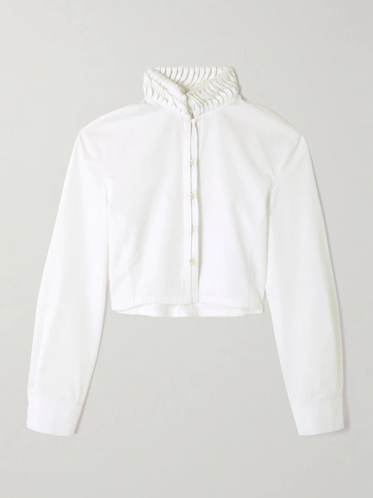 Image of a model wearing Tops. Product name - Cropped Folded Cotton-poplin Shirt in White colour by brand - Alaïa