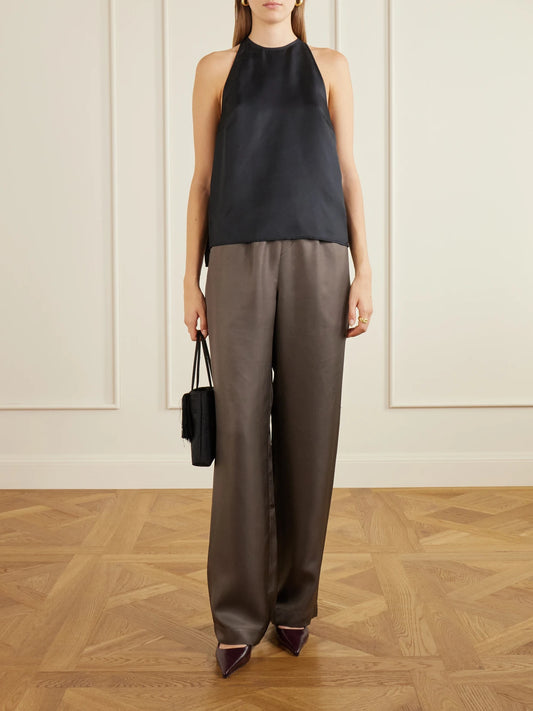 Image of a model wearing Tops. Product name - Silk Tank in Brown colour by brand - Loulou de Saison