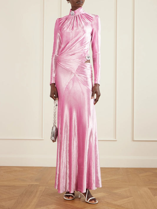 Image of a model wearing Skirts. Product name - Wrap-effect Crystal-embellished Velvet Maxi Skirt in Bright pink colour by brand - RABANNE