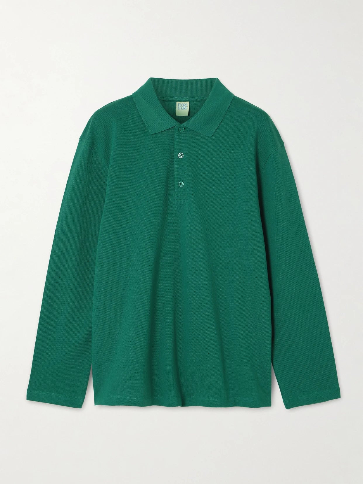 Image of a model wearing Tops. Product name - Diana Organic Cotton-piqué Polo Shirt in Green colour by brand - FLORE FLORE