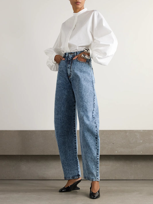 Image of a model wearing Tops. Product name - Cotton-poplin Blouse in White colour by brand - Alaïa