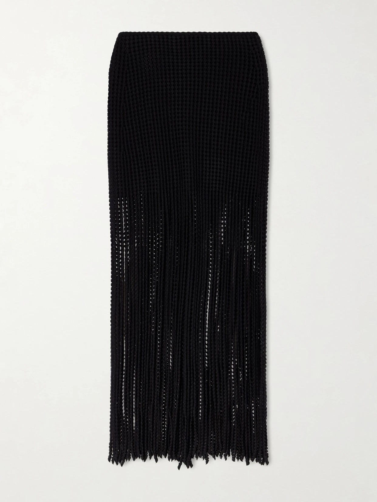 Image of a model wearing Skirts. Product name - Knitted Fringed Midi Skirt in Black colour by brand - Alaïa