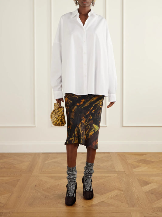 Image of a model wearing Tops. Product name - Casia Cotton-poplin Shirt in White colour by brand - Dries Van Noten
