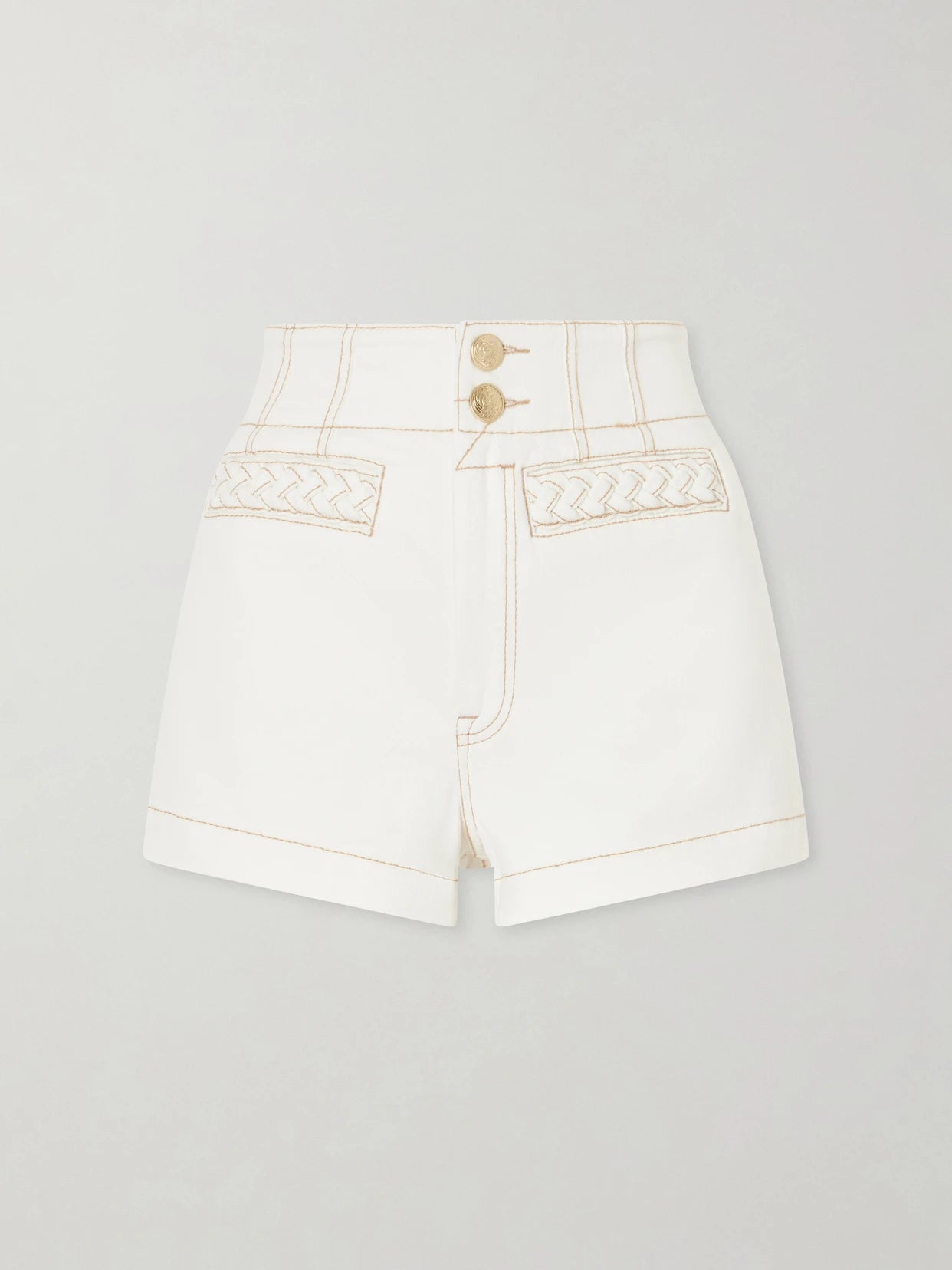 Image of a model wearing Shorts. Product name - Roselight Denim Shorts in Cream colour by brand - Zimmermann